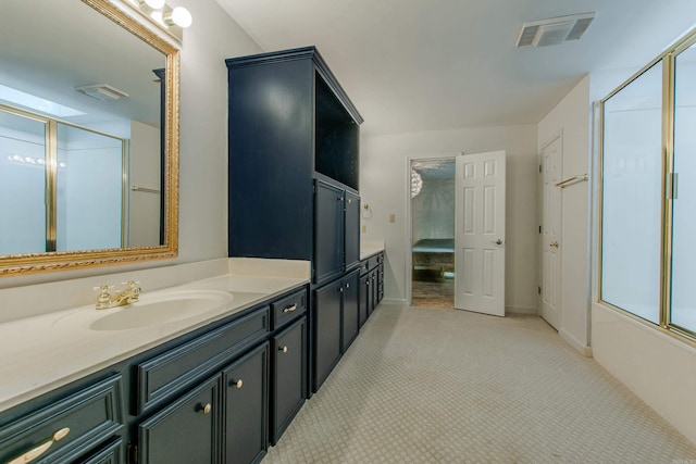 10 Silverwood Ct, North Little Rock, AR 72116 - ensuite bathroom featuring a shower with door and vanity