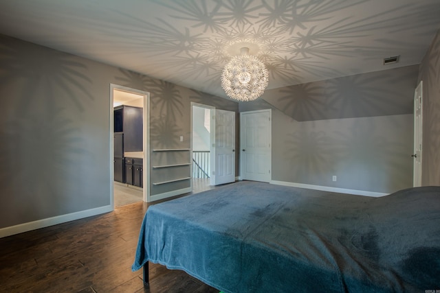 10 Silverwood Ct, North Little Rock, AR 72116 - unfurnished bedroom featuring hardwood / wood-style flooring, a chandelier, baseboards, and ensuite bathroom