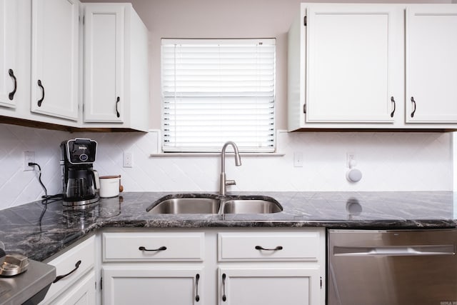 1520 Calgary Cv, Little Rock, AR 72211 - kitchen featuring stainless steel dishwasher, a sink, white cabinetry, and decorative backsplash