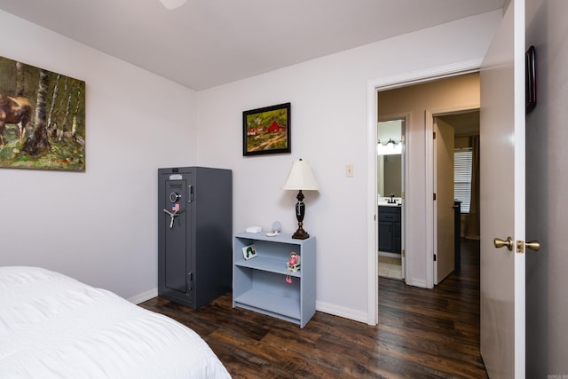 1520 Calgary Cv, Little Rock, AR 72211 - bedroom with dark wood-type flooring and baseboards