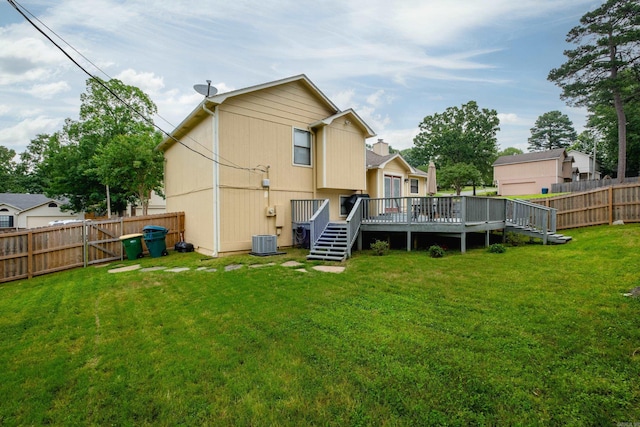 1520 Calgary Cv, Little Rock, AR 72211 - rear view of property featuring a wooden deck and central AC unit