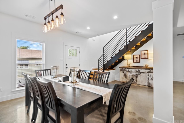 305 W Cross St, Benton, AR 72015 - dining space featuring finished concrete flooring, stairway, baseboards, and recessed lighting