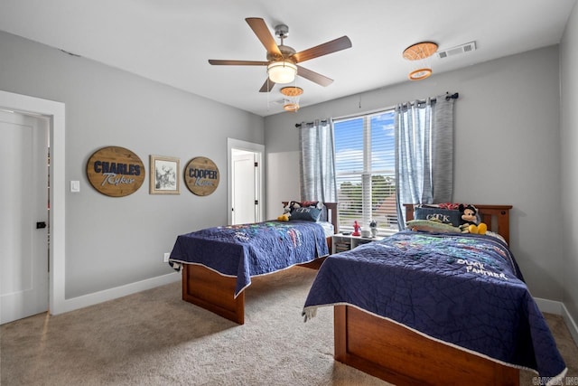 305 W Cross St, Benton, AR 72015 - bedroom featuring baseboards, carpet, and a ceiling fan