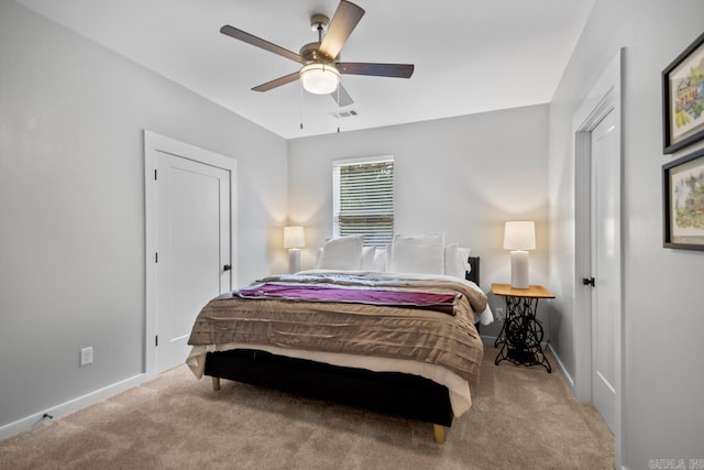 305 W Cross St, Benton, AR 72015 - bedroom featuring carpet, baseboards, and a ceiling fan