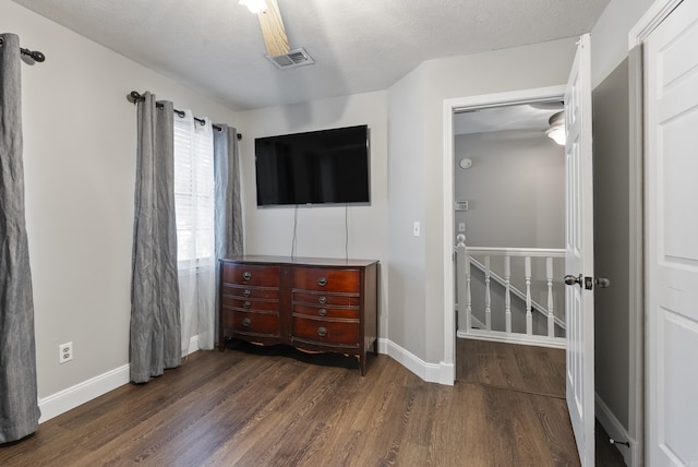 40 High Timber Dr, Maumelle, AR 72113 - bedroom with wood finished floors and baseboards