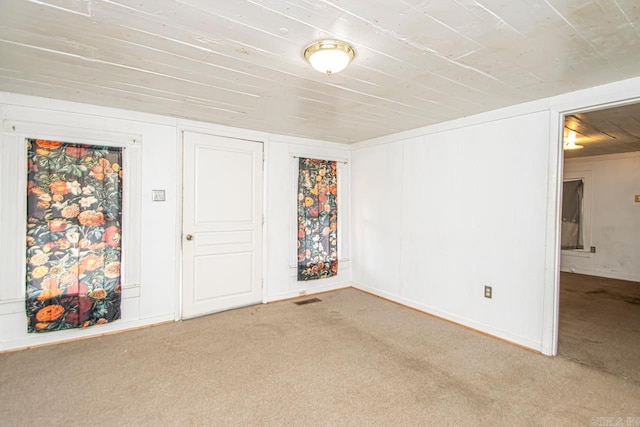 1523 W 46, North Little Rock, AR 72118 - carpeted spare room featuring wooden ceiling and baseboards
