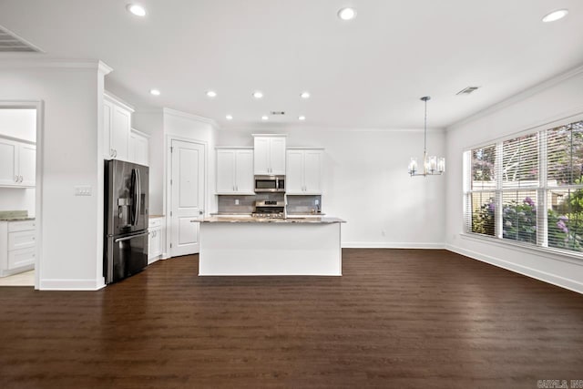425 Valley Ranch Cir, Little Rock, AR 72223 - kitchen with stainless steel appliances, recessed lighting, baseboards, decorative backsplash, and dark wood-type flooring