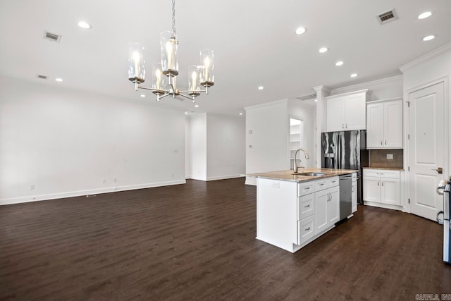 425 Valley Ranch Cir, Little Rock, AR 72223 - kitchen with crown molding, dishwasher, a chandelier, recessed lighting, and open floor plan