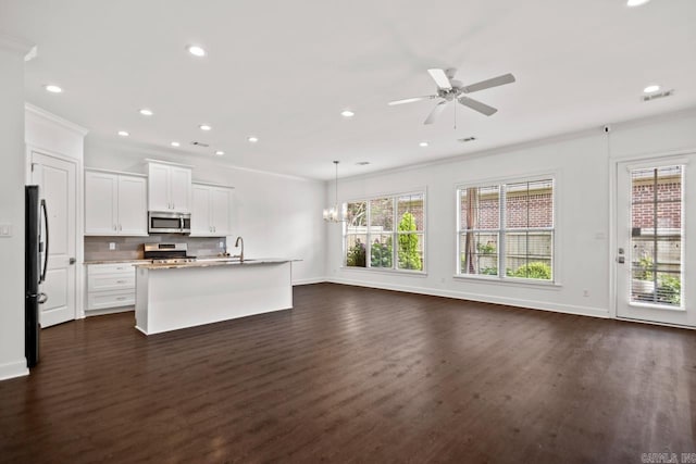 425 Valley Ranch Cir, Little Rock, AR 72223 - kitchen with appliances with stainless steel finishes, dark wood-style flooring, decorative backsplash, recessed lighting, and baseboards