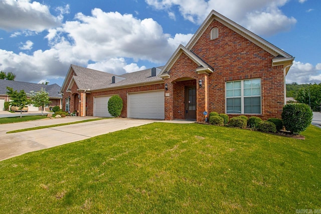 425 Valley Ranch Cir, Little Rock, AR 72223 - view of front of home with brick siding, driveway, a garage, a front lawn, and roof with shingles