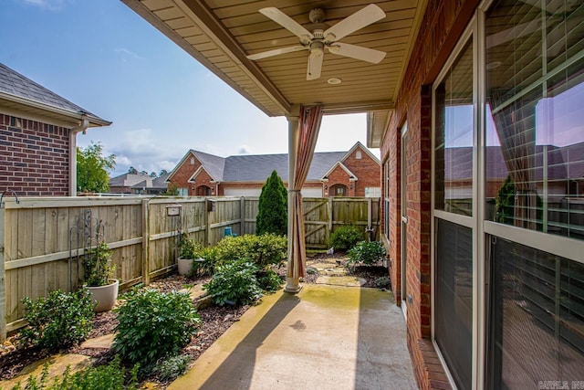 425 Valley Ranch Cir, Little Rock, AR 72223 - fenced backyard with ceiling fan and a patio