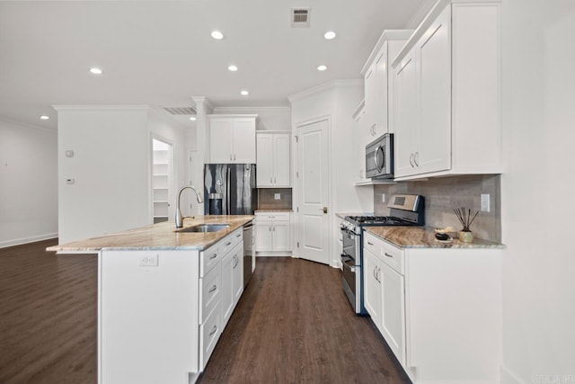 425 Valley Ranch Cir, Little Rock, AR 72223 - kitchen featuring stainless steel appliances, a sink, crown molding, recessed lighting, and dark wood-style flooring