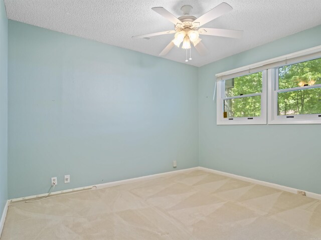 6 Sierra Ln, Hot Springs Village, AR 71909 - carpeted spare room with a textured ceiling, baseboards, and ceiling fan