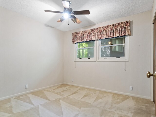 6 Sierra Ln, Hot Springs Village, AR 71909 - empty room featuring light carpet, ceiling fan, a textured ceiling, and baseboards