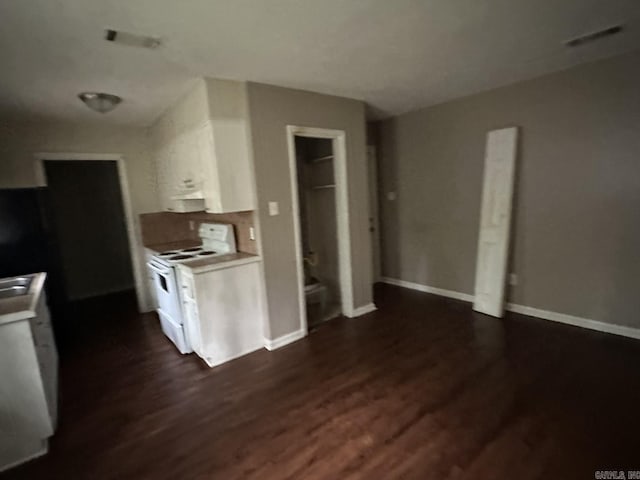 3509 Arapaho Trl, Little Rock, AR 72209 - kitchen with electric range, white cabinetry, dark wood-style floors, and light countertops