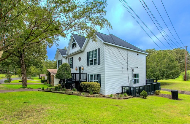 6220 Hopi Dr, North Little Rock, AR 72116 - view of home's exterior featuring a wooden deck and a yard