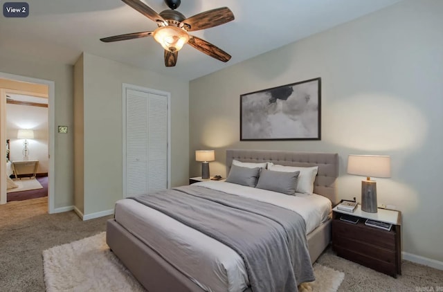 6220 Hopi Dr, North Little Rock, AR 72116 - bedroom with light colored carpet, a closet, baseboards, and ceiling fan