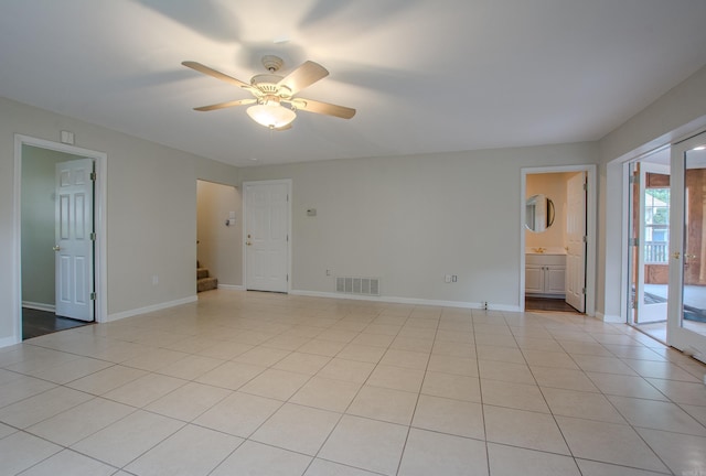 6220 Hopi Dr, North Little Rock, AR 72116 - spare room featuring stairs, a ceiling fan, and baseboards