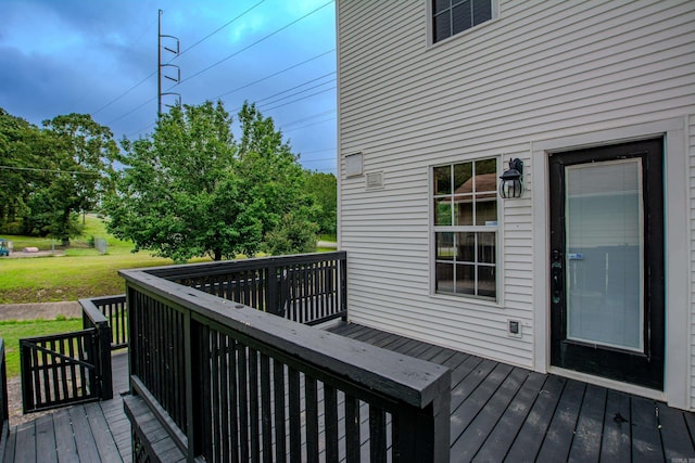 6220 Hopi Dr, North Little Rock, AR 72116 - wooden deck with a lawn