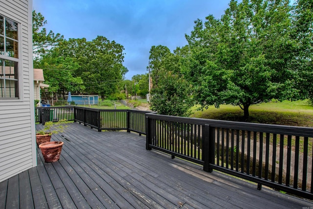 6220 Hopi Dr, North Little Rock, AR 72116 - deck featuring view of wooded area