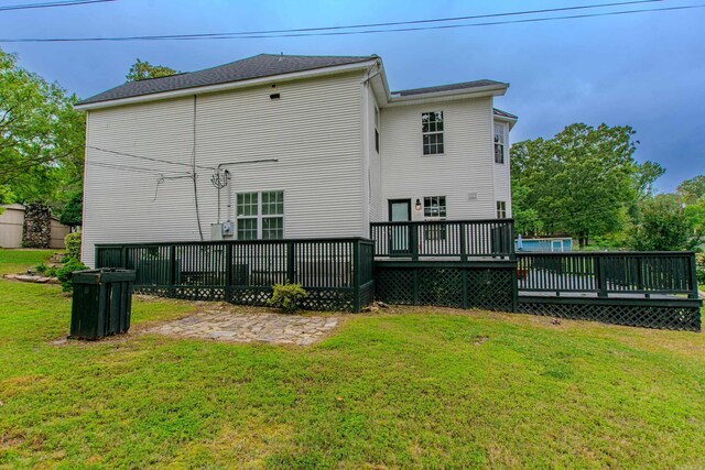 6220 Hopi Dr, North Little Rock, AR 72116 - back of property featuring a deck and a yard
