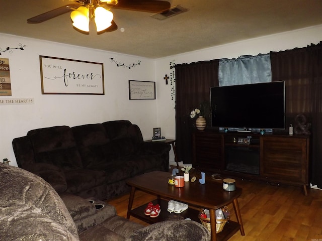 1020 Pioneer Rd, Searcy, AR 72143 - living room with ceiling fan and wood finished floors