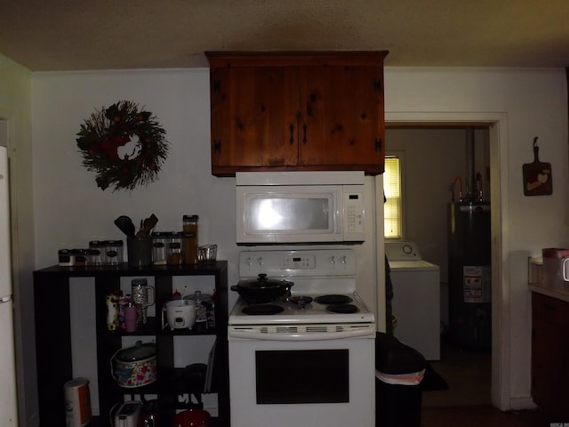 1020 Pioneer Rd, Searcy, AR 72143 - kitchen featuring white appliances, washer / dryer, and water heater