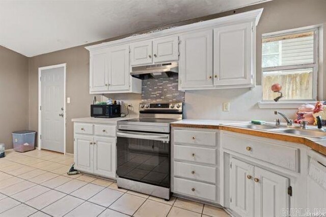 503 Westpine Dr, Hot Springs, AR 71913 - kitchen with stainless steel electric stove, under cabinet range hood, black microwave, white cabinetry, and light countertops