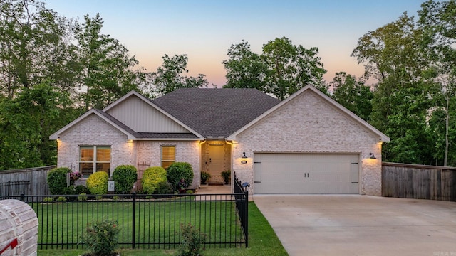 600 Lucy Ln, Alexander, AR 72002 - view of front of property with brick siding, an attached garage, driveway, and board and batten siding