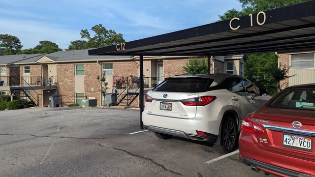 1201 Airport Rd Unit C12, Hot Springs, AR 71913 - covered parking lot featuring stairway