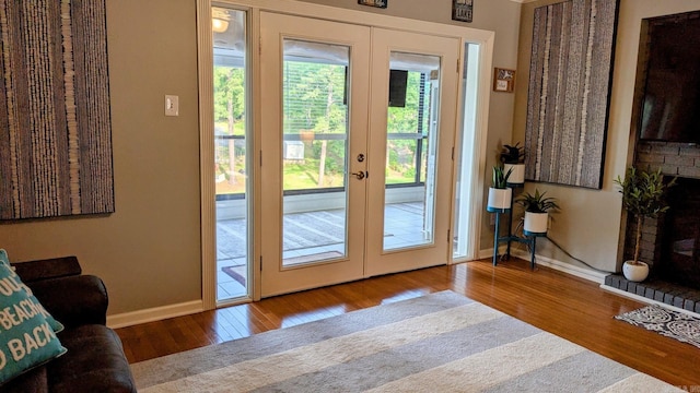 1201 Airport Rd Unit C12, Hot Springs, AR 71913 - entryway with french doors, wood finished floors, and baseboards