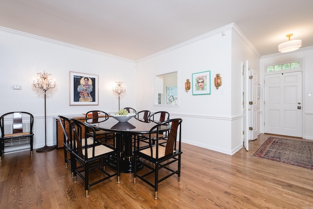 3501 Oakwood Rd Unit 9, Little Rock, AR 72202 - dining area with ornamental molding, wood finished floors, and baseboards