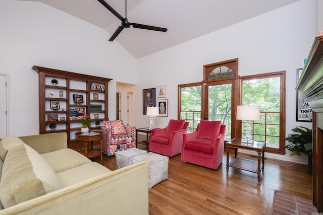 3501 Oakwood Rd Unit 9, Little Rock, AR 72202 - living area featuring high vaulted ceiling, wood finished floors, and ceiling fan