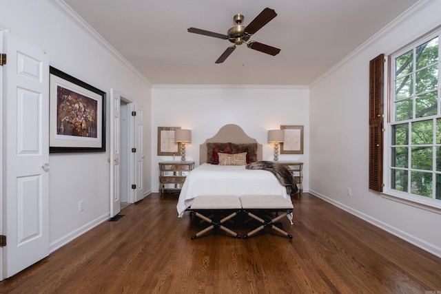 3501 Oakwood Rd Unit 9, Little Rock, AR 72202 - bedroom with crown molding, wood finished floors, multiple windows, and baseboards