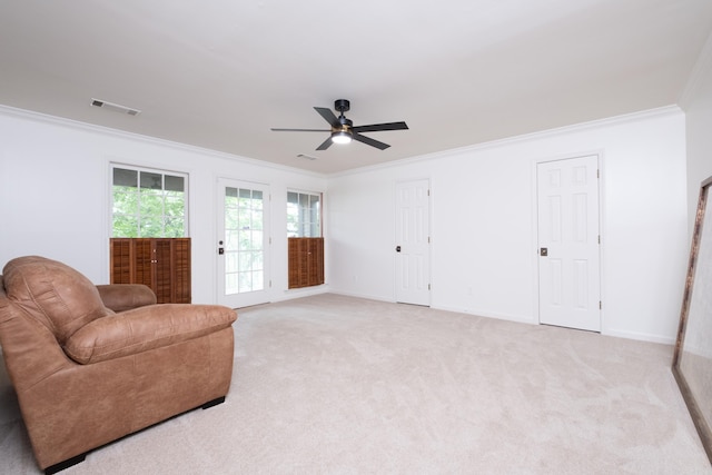 3501 Oakwood Rd Unit 9, Little Rock, AR 72202 - sitting room with ornamental molding, ceiling fan, light colored carpet, and baseboards