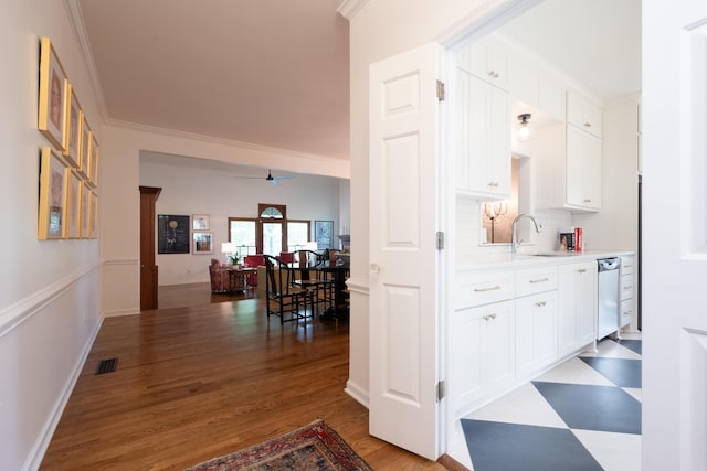 3501 Oakwood Rd Unit 9, Little Rock, AR 72202 - corridor with a sink, wood finished floors, and ornamental molding