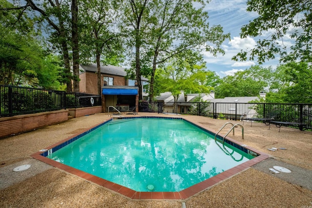 3501 Oakwood Rd Unit 9, Little Rock, AR 72202 - view of swimming pool with a patio