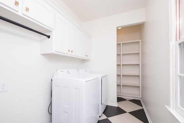 3501 Oakwood Rd Unit 9, Little Rock, AR 72202 - laundry area with tile patterned floors, washing machine and clothes dryer, cabinet space, and baseboards