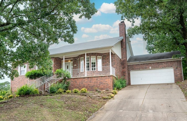 4 Hunter Ct, Little Rock, AR 72211 - ranch-style home featuring brick siding, concrete driveway, a garage, covered porch, and a chimney