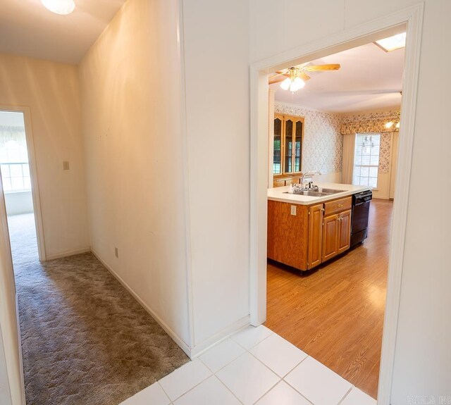 4 Hunter Ct, Little Rock, AR 72211 - hall featuring a sink, baseboards, and wallpapered walls