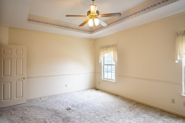 4 Hunter Ct, Little Rock, AR 72211 - spare room with a raised ceiling, carpet, ceiling fan, baseboards, and crown molding