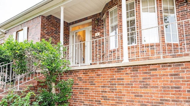 4 Hunter Ct, Little Rock, AR 72211 - property entrance with brick siding and covered porch