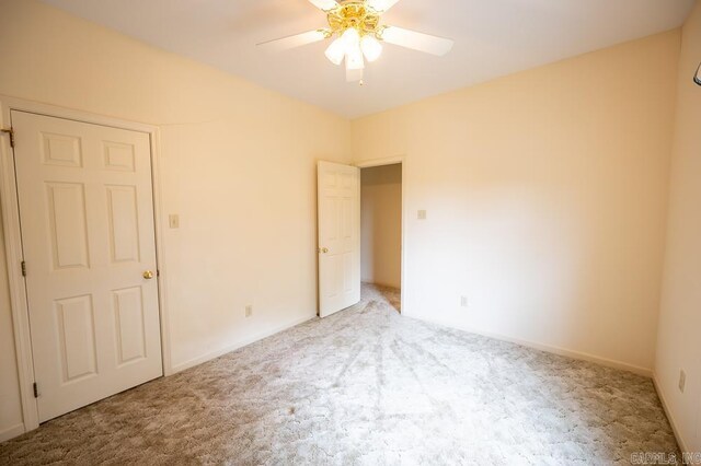 4 Hunter Ct, Little Rock, AR 72211 - unfurnished bedroom featuring carpet flooring and a ceiling fan
