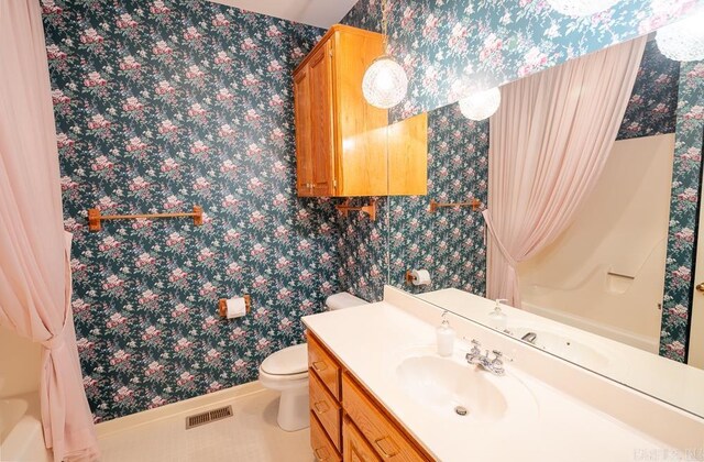 4 Hunter Ct, Little Rock, AR 72211 - bathroom with wallpapered walls, toilet, vanity, a shower with shower curtain, and tile patterned floors