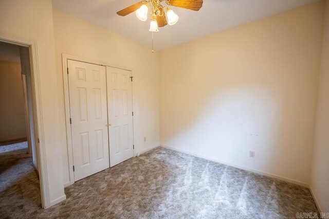 4 Hunter Ct, Little Rock, AR 72211 - unfurnished bedroom with carpet flooring, a closet, baseboards, and a ceiling fan