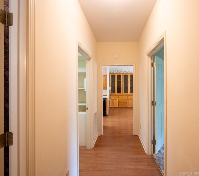 4 Hunter Ct, Little Rock, AR 72211 - hall with light wood finished floors and baseboards