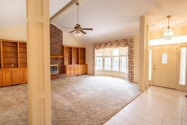 4 Hunter Ct, Little Rock, AR 72211 - carpeted foyer entrance featuring ceiling fan, a brick fireplace, and tile patterned flooring