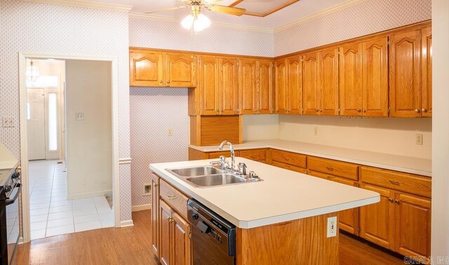 4 Hunter Ct, Little Rock, AR 72211 - kitchen with wallpapered walls, black dishwasher, a sink, brown cabinetry, and a center island with sink