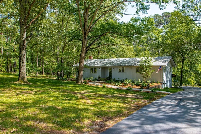 9425 Hogue Rd, Mabelvale, AR 72103 - ranch-style home with a front yard