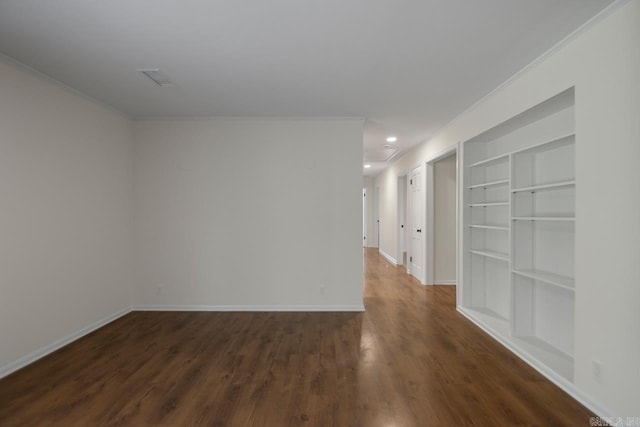 9425 Hogue Rd, Mabelvale, AR 72103 - unfurnished room featuring built in shelves, ornamental molding, dark wood-style floors, baseboards, and recessed lighting